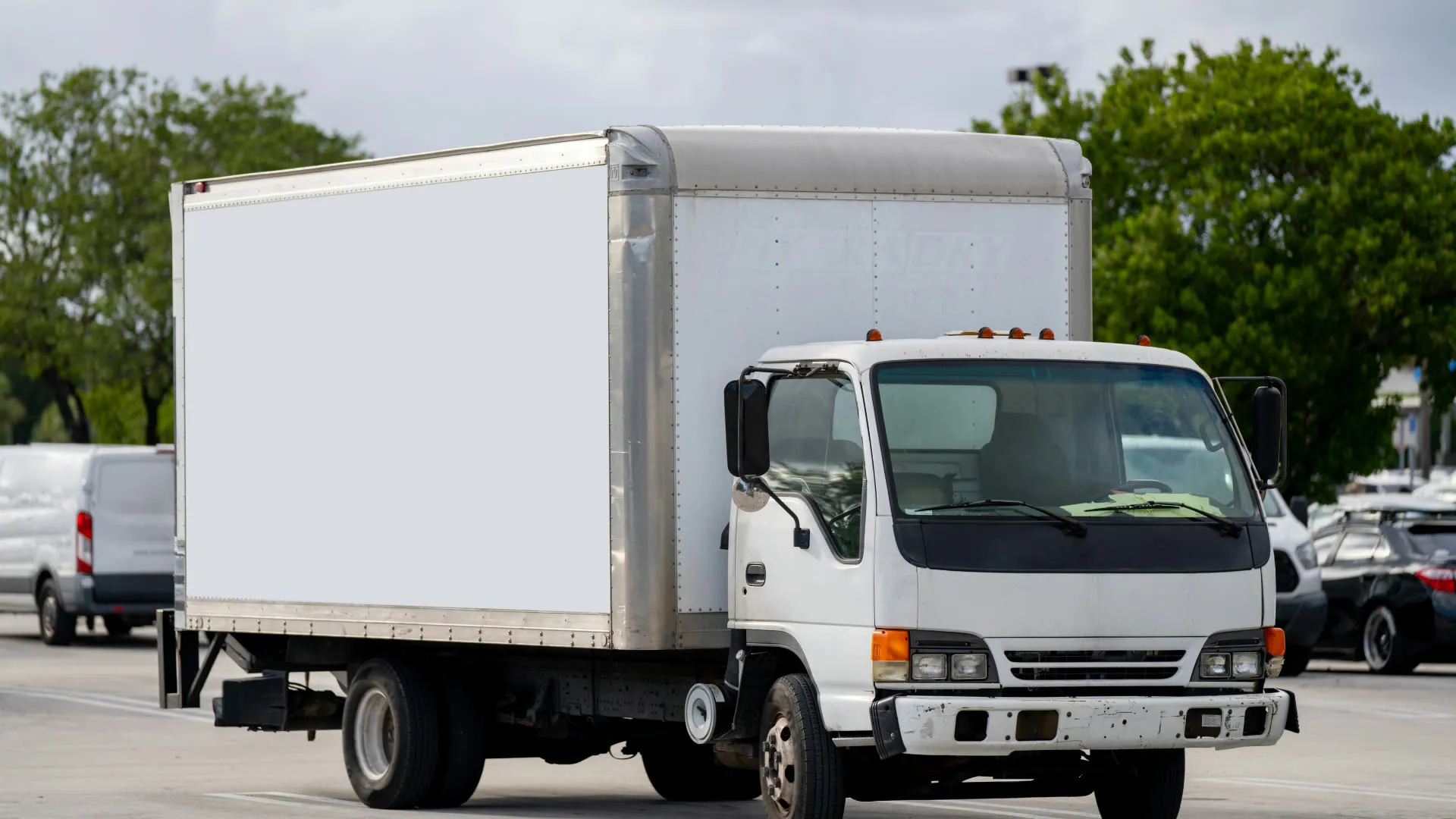 White box truck parked in a lot
